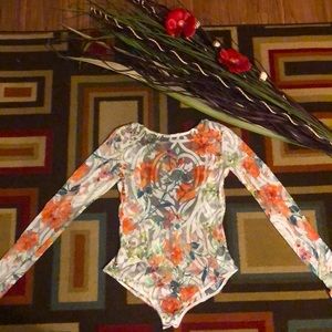 Hello Beauties. I have for you a laced bodysuit